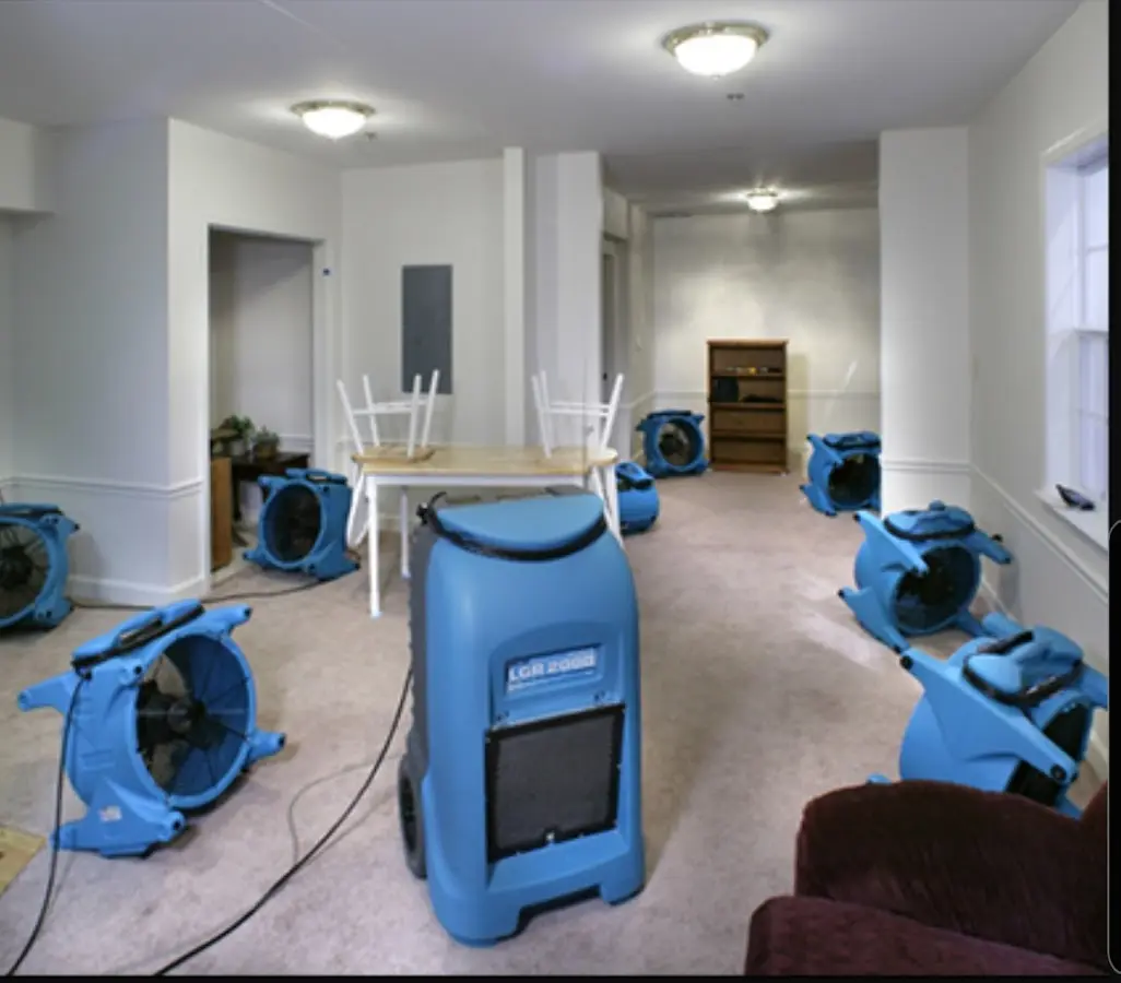 Air movers and dehumidifier setup for Water Damage Restoration in South River
